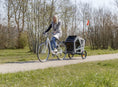 Bild in Galerie-Betrachter laden, Der Trixie Fahrrad-Anhänger ideal für grössere Hunde macht es möglich! Mit seiner innovativen Federung und dem komfortablen Innenraum bietet er deinem Hund eine angenehme Fahrt.